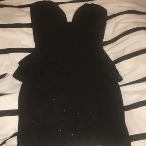 Low cut mini peplum black dress